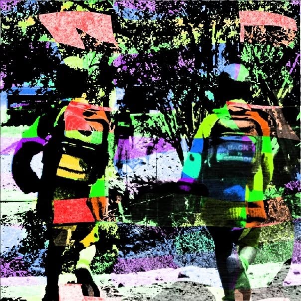 Back to school bliss: two children with backpacks walking away, the photo broken into vivid green, orange and violet patches